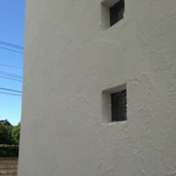 アーチ窓のある家。施工例